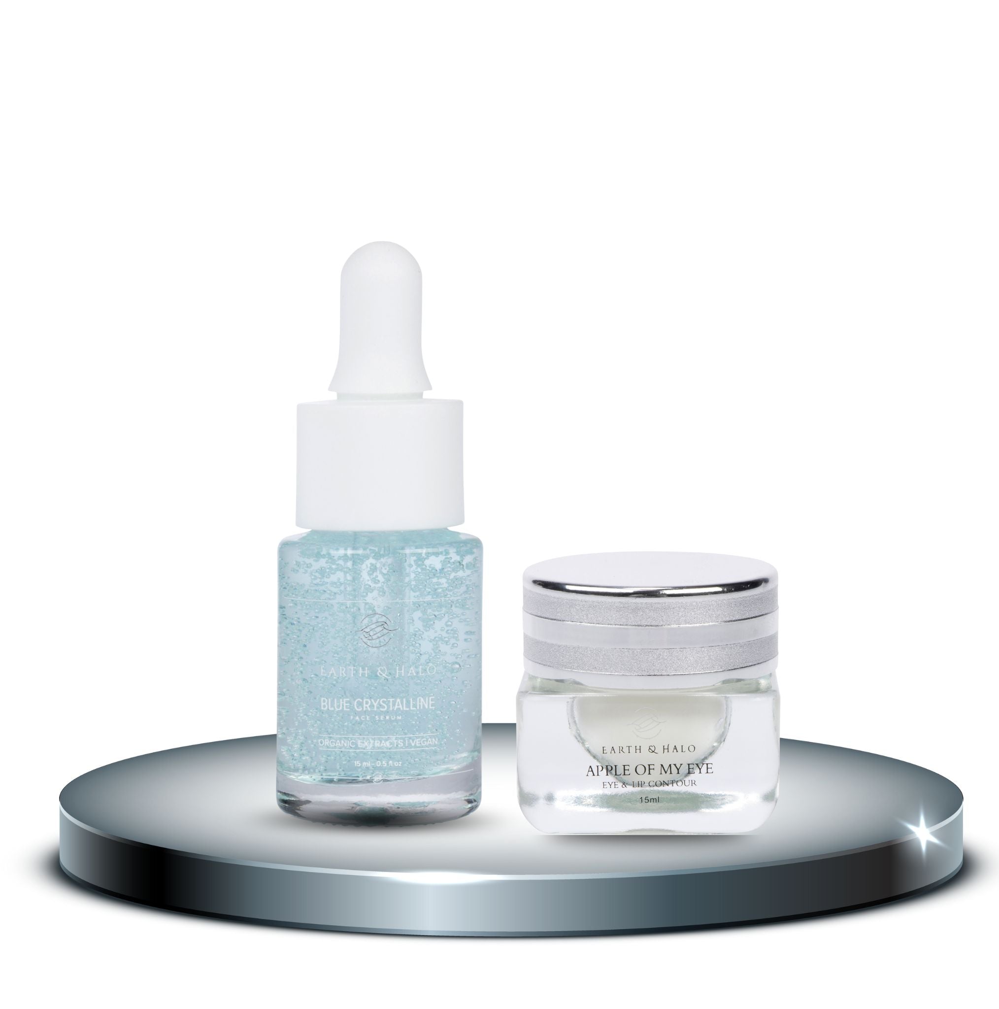 Earth & Halo First Class Facial travel set featuring Blue Crystalline serum and Apple Of My Eye contour in a white box.